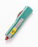 Microtech UTX-85 Bounty Hunter OTF Auto Knife Apocalyptic Drop Point Blade/Green Apocalyptic Alum. Handle SKU 231-10BH