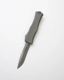 Microtech Hera II Recurve Auto OTF Knife Apocalyptic Bohler M390MK Stainless Steel Blade/Natural Clear Deep Engraved Aircraft Alum. Handle SKU 1705-10APNC