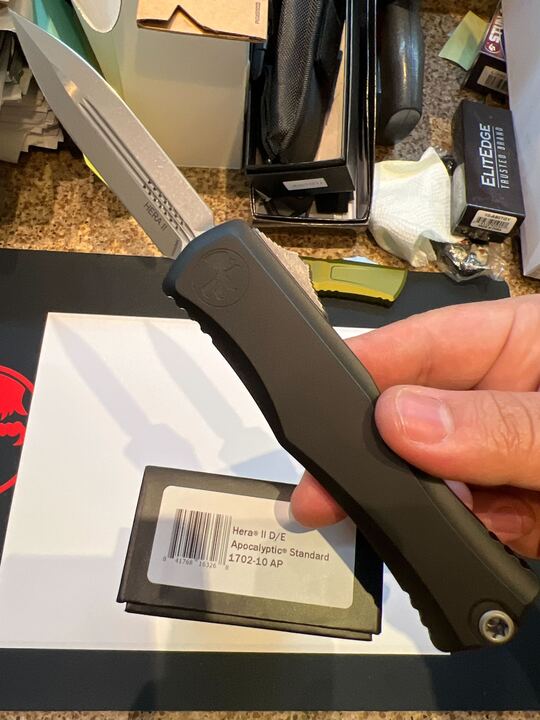 Microtech Hera II Apocalyptic Standard OTF Knife Double Edge M390 SS Blade/Black Alum. Handle SKU 1702-10AP