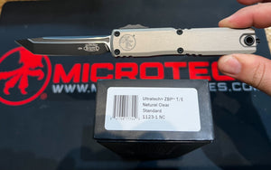 Microtech Ultratech Gen III ZBP OTF Knife Black Tanto M390MK Steel Blade/Natural Clear 6061-T6 Aluminum Handle SKU 1123-1NC