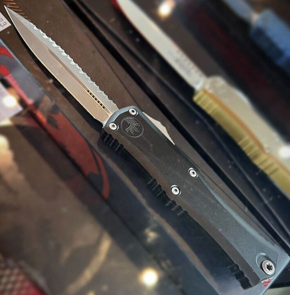 Microtech Mini Hera Apocalyptic OTF Knife Double Edge Full Serr. Stonewash M390MK SS Blade/Black Alum. Handle SKU 1702M-12AP