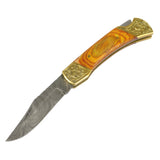 The Bone Edge Handmade Folding Knife w/Leather Sheath Damascus Steel Blade/Natural Color Wood Handle with Brass Accents SKU 13614