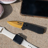 SOG Ultra XR Carbon and Gold Folding Knife SKU 12-63-02-57